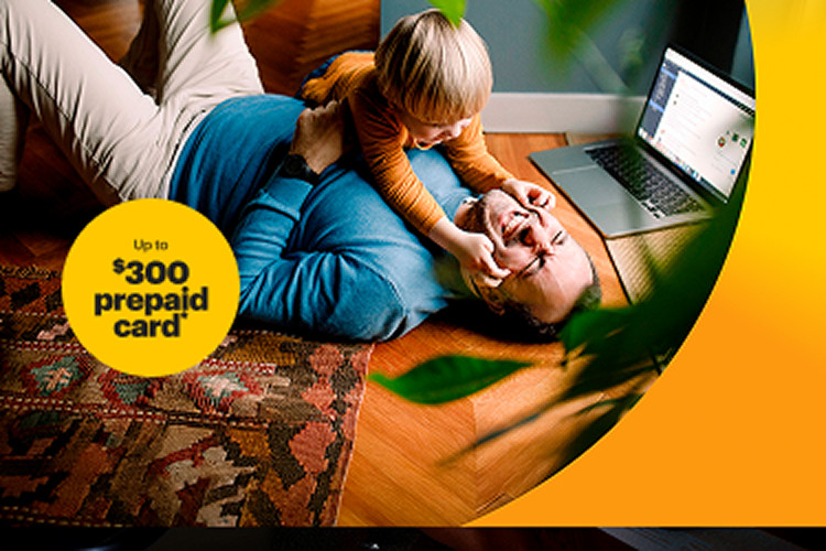Family relaxing together at home, with a child sitting on a parent’s lap and a laptop nearby, connected with Brightspeed Internet.