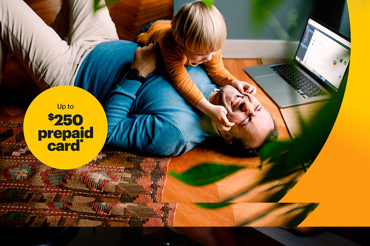 Family relaxing together at home, with a child sitting on a parent’s lap and a laptop nearby, connected with Brightspeed Internet.