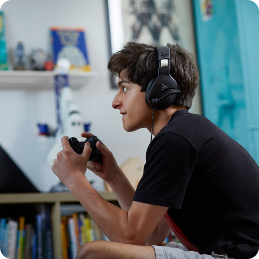 A boy playing the game with internet services provided by Brightspeed.